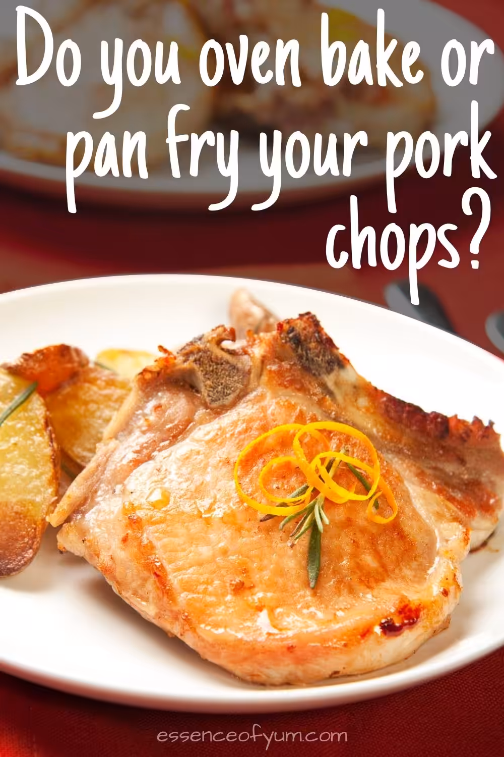 Two golden brown tender juicy pork chops on a white plate with the question do you oven bake or pan fry your pork chops.