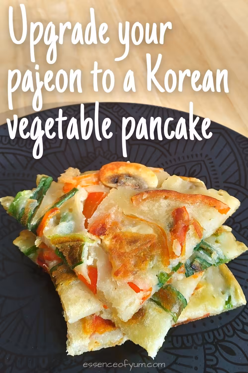 Closeup of a stack of wedges of golden brown Korean mushroom, bell pepper and green onion pancake with the text upgrade your pajeon to a Korean vegetable pancake.