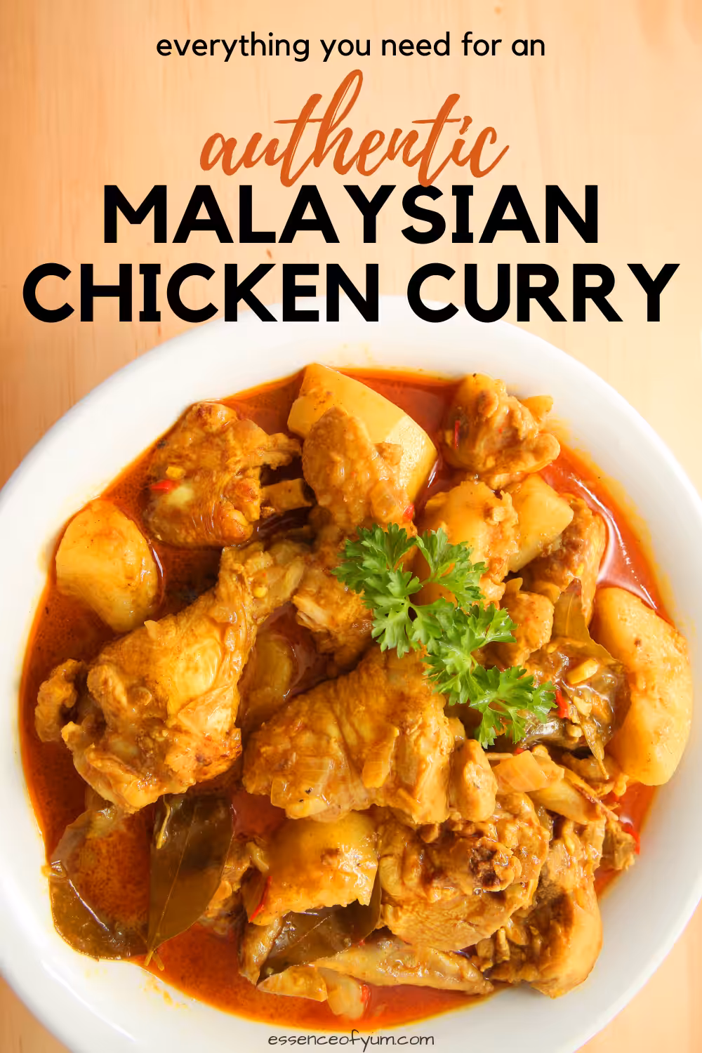 Closeup of a white bowl full of curry with chicken pieces and potatoes with the text every you need for an authentic Malaysian chicken curry.
